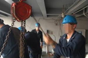 Lifting a weight with a pulley