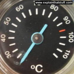 A dial thermometer in a gas boiler