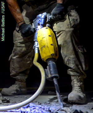 Jackhammer pneumatic drill by John Curtis, US Navy