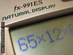 LCD pocket calculator screen showing numbers made from pixels.