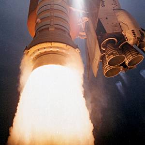 Close up of a Space Shuttle main engine nozzle and flames at blastoff