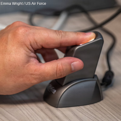 A SecuGen Hamster IV USB fingerprint scanner.