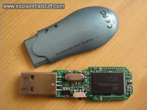 USB memory stick with the top case removed, showing a chip inside